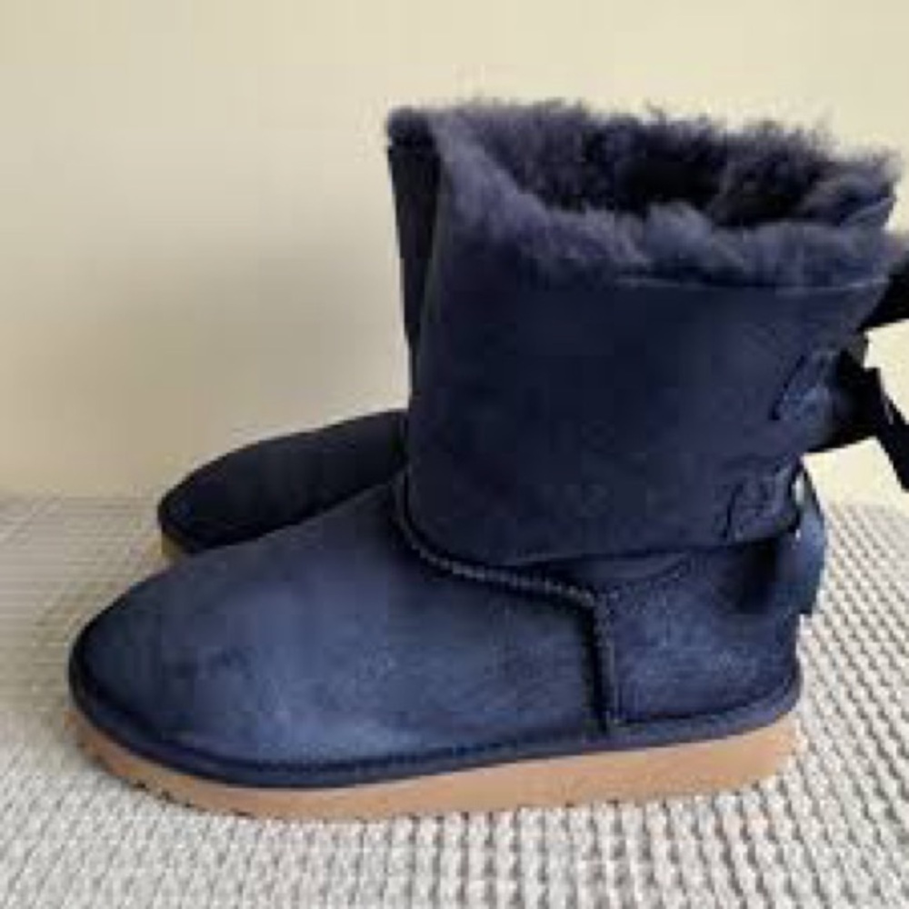 UGG Kid’s Bailey Bow II boots in a navy blue suede